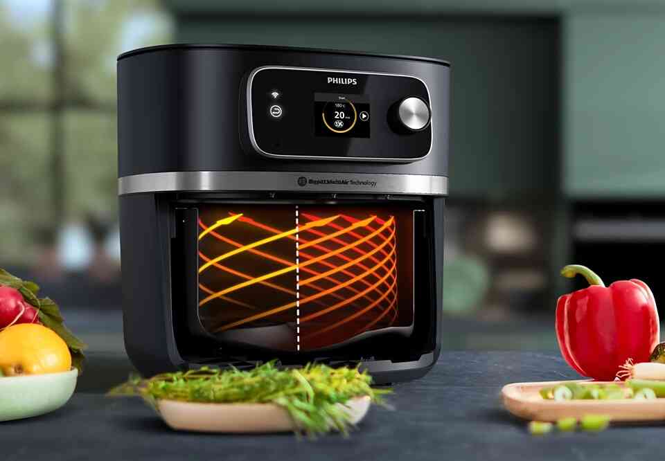Philips Airfryer HD9880/90, Twin TurboStar tehnologija, cirkulacija vrućeg vazduha za hrskavu hranu, efikasno prženje sa minimalnim uljem.