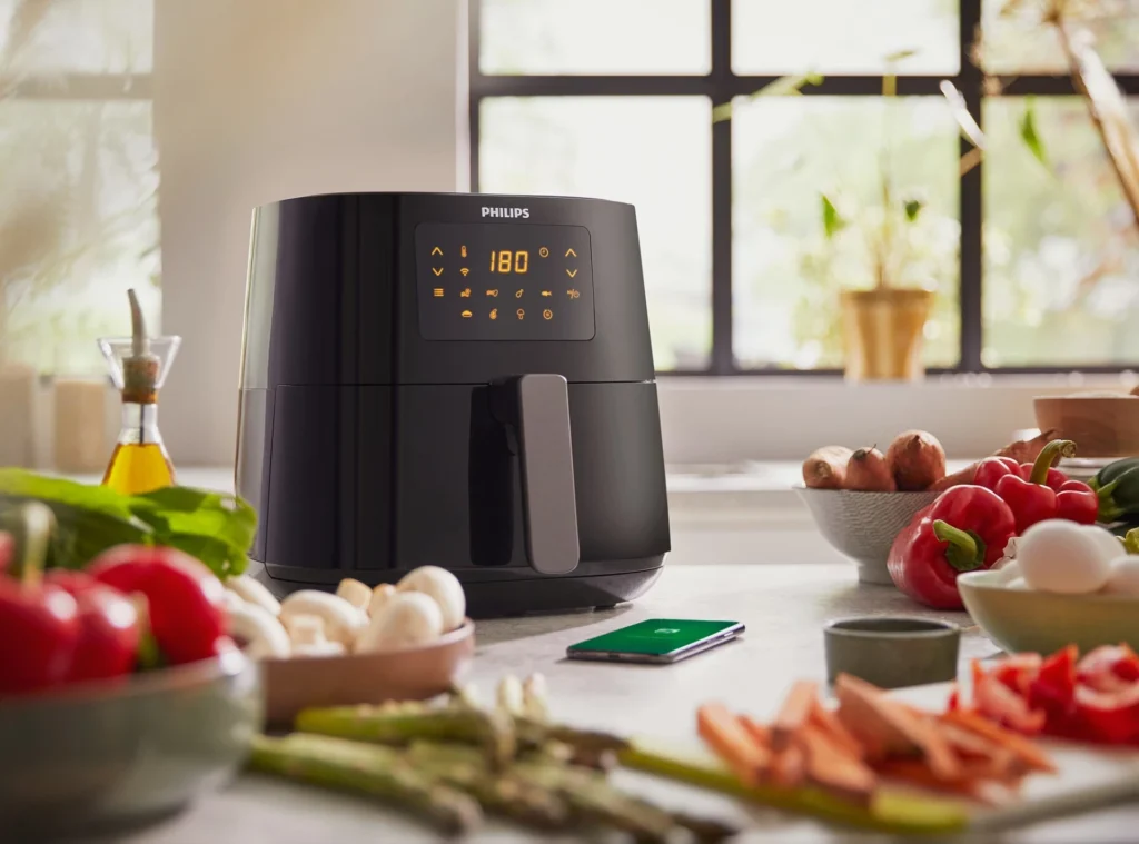 Philips Airfryer HD9280/90 friteza na vruć vazduh sa povrćem pored